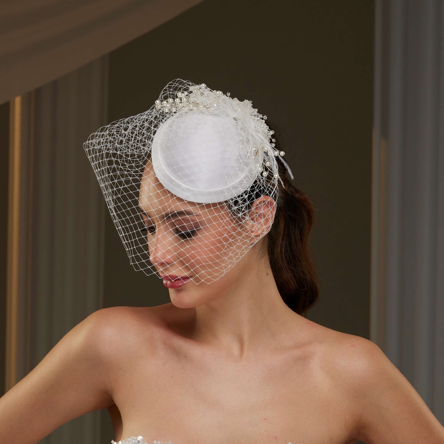 Elegant Bridal Fascinator with Birdcage Veil, Pearls & Feathers