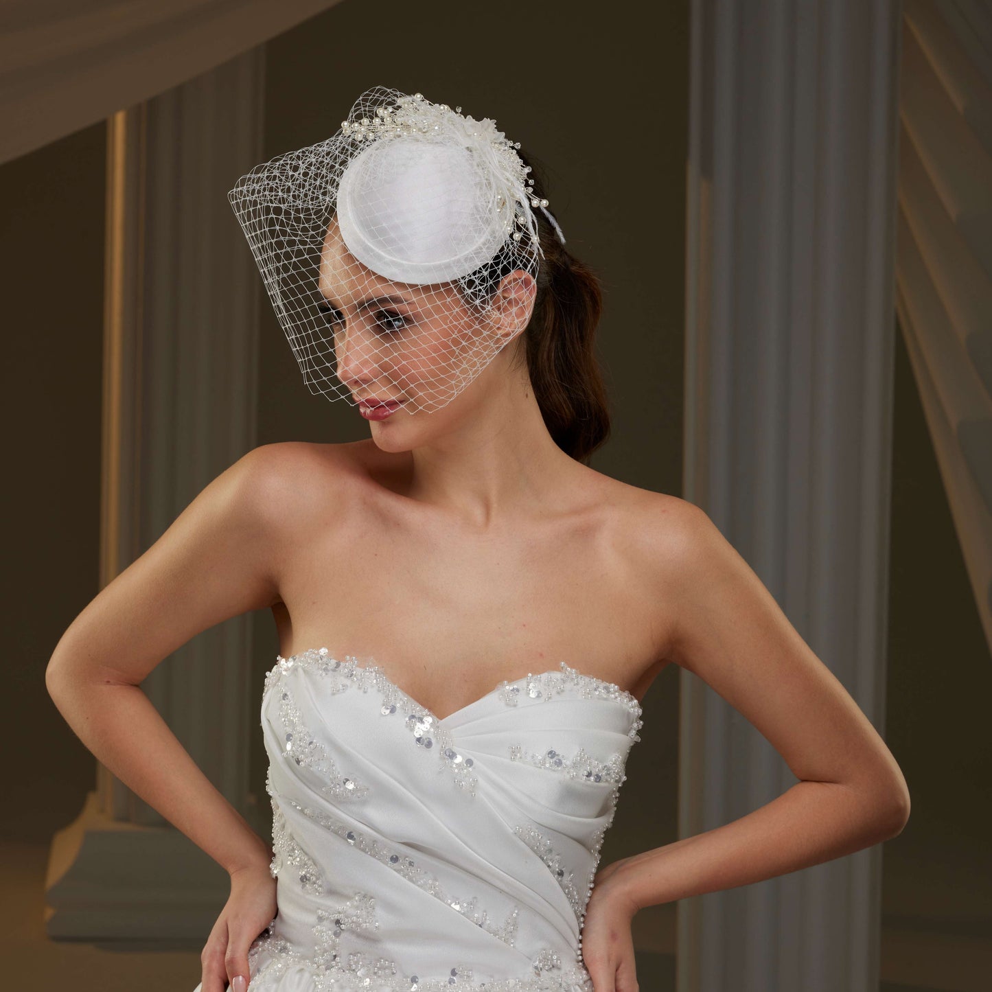Elegant Bridal Fascinator with Birdcage Veil, Pearls & Feathers