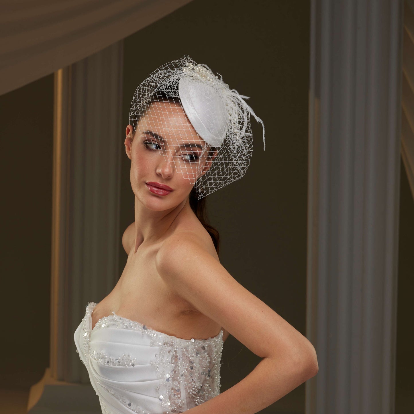 Elegant Bridal Fascinator with Birdcage Veil, Pearls & Feathers