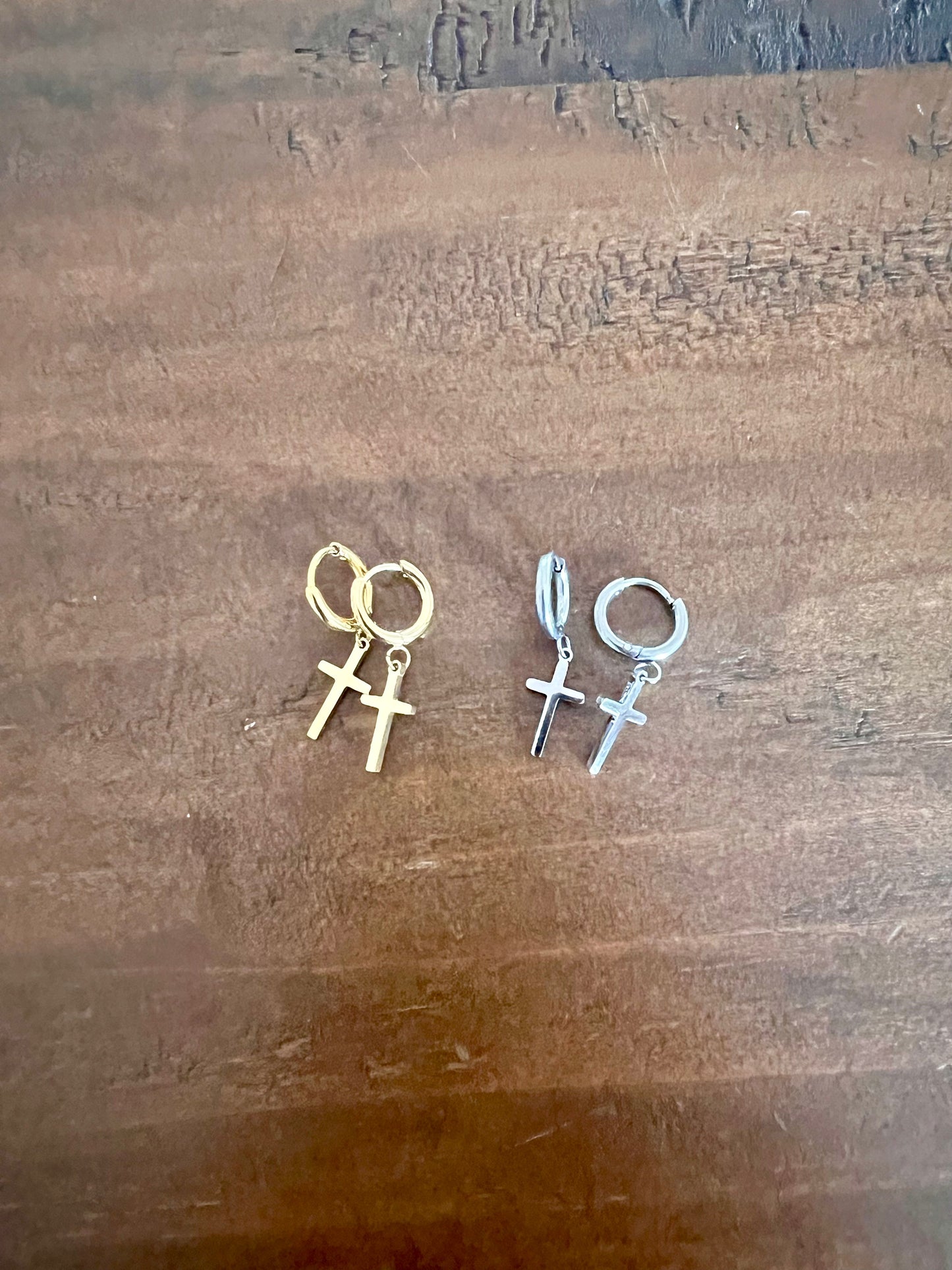 cross huggie earrings