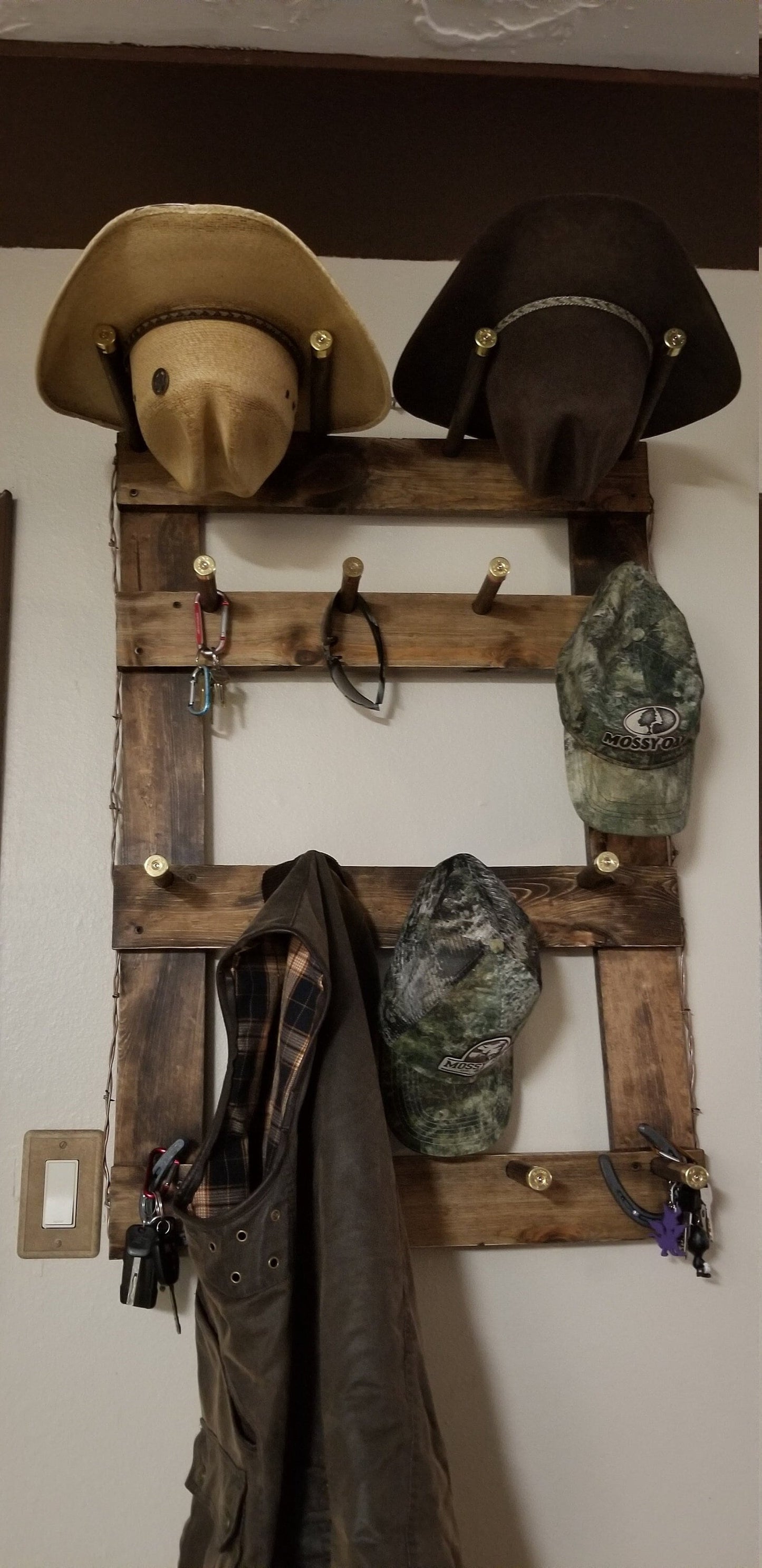 The Vertical Command Center: 2 Cowboy Hats + 12 Ball Caps