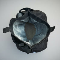 Strongman throwing bags