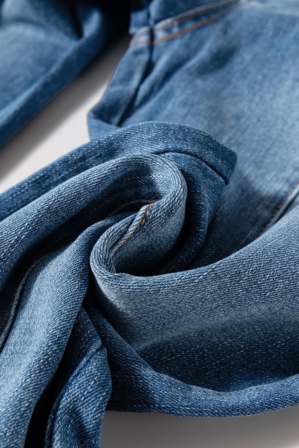 Sail Blue High Waist Jeans With Button Fly And Raw Hem