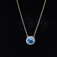 Swiss Blue Topaz and Diamond Halo Necklace With Silver Chain
