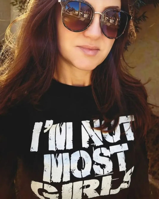 NOT MOST GIRLS Tee