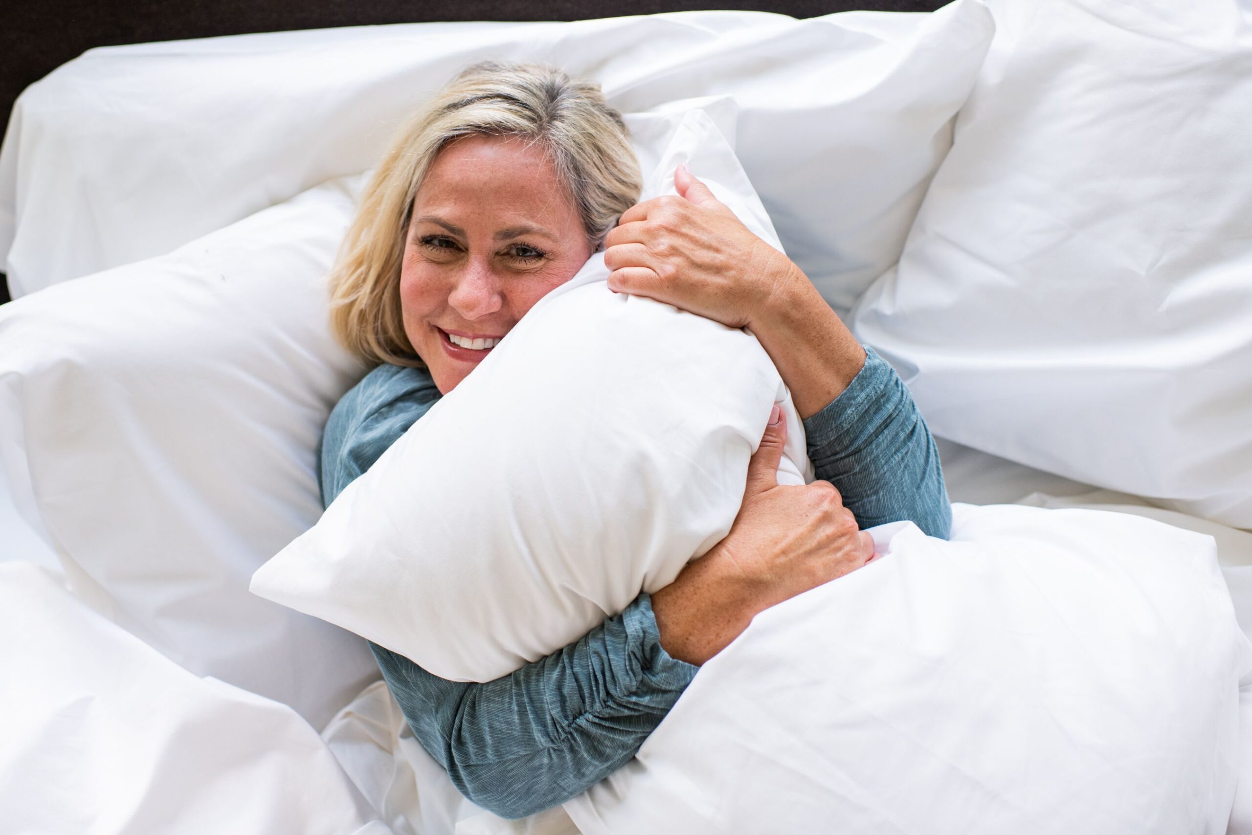 Woman holding pillow